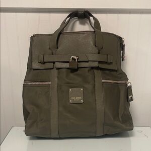 Henri Bendel Green Backpack with Structured Design and Metal Hardware